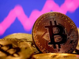Bitcoin hits record high amid Wall Street momentum