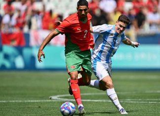 Pitch invasion halts Argentina-Morocco game as VAR reviews final goal