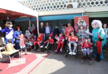 AMI has officially been given public utility status for its work helping children with cerebral palsy and their families.